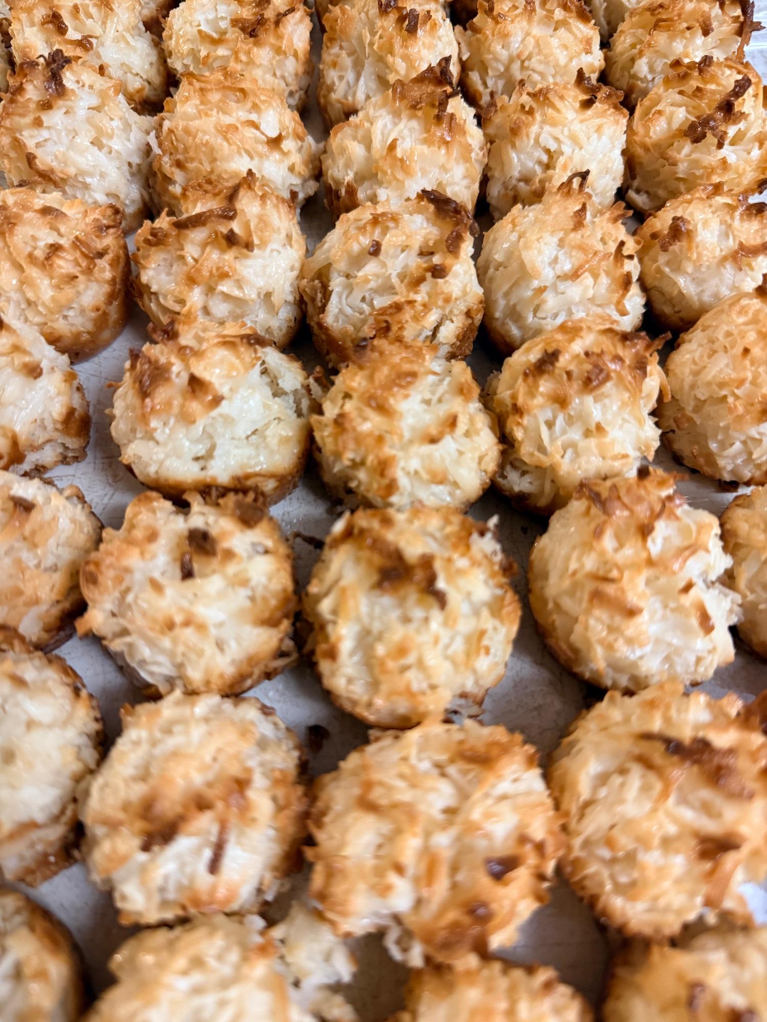 Golden coconut kisses showing their characteristic crispy, toasted exterior